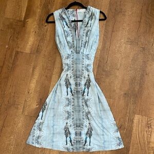 Salgiano one of a kind strapless dress with British looking horse riders. Size M